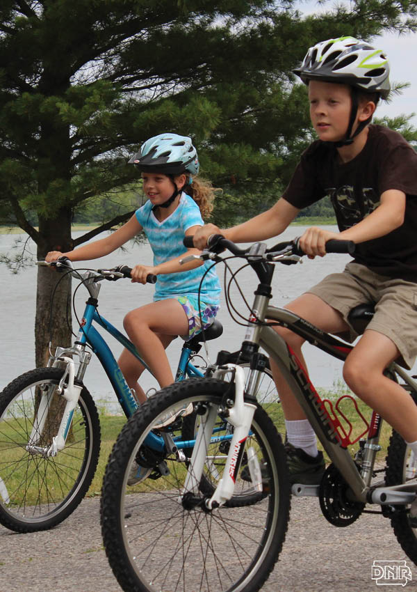 Simple steps can improve air quality and help protect the outdoors for those with developing lungs, like kids riding bikes | Iowa DNR